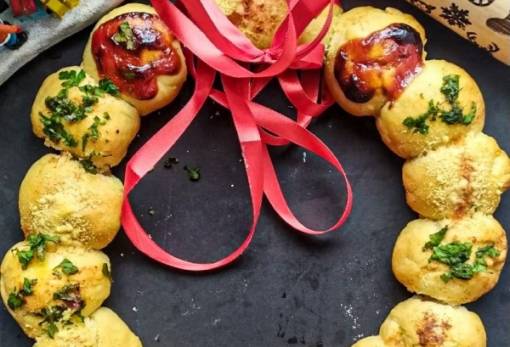 Μια συνταγή για το εορταστικό τραπέζι: Στεφάνι με σκορδόψωμα